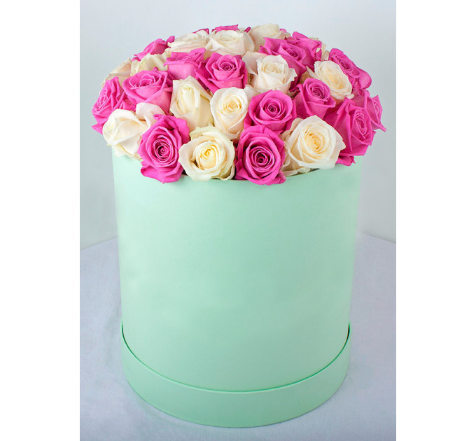 39 троянд у капелюшної коробці